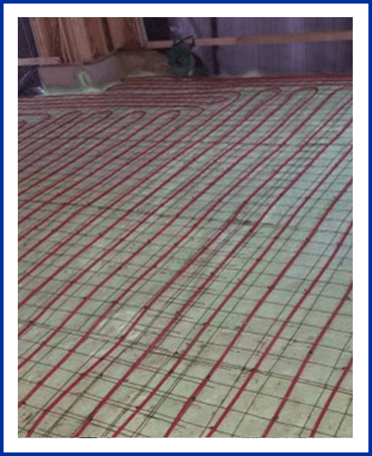 A floor heating system in the process of being installed.