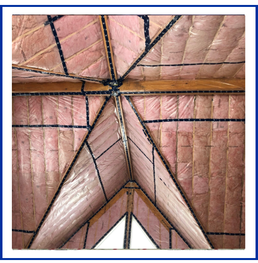 A close up of the roof structure of a building